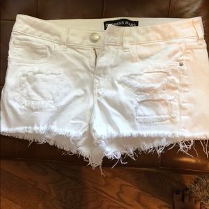 Express distressed white shorts